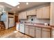 Bright kitchen with tile flooring, vintage cabinetry and appliances at 753 S Utica St, Denver, CO 80219