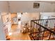 View from upstairs showing the kitchen, dining area, and living room at 753 S Utica St, Denver, CO 80219