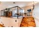 Multilevel living room featuring hardwood floors and access to outdoor area at 753 S Utica St, Denver, CO 80219
