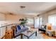 Comfortable living room featuring hardwood floors and easy outdoor access at 753 S Utica St, Denver, CO 80219