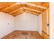 Unfinished shed interior with plywood floor and ceiling, and partial drywall walls at 753 S Utica St, Denver, CO 80219
