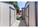 Exterior side view of row of sheds for extra outdoor storage at 753 S Utica St, Denver, CO 80219