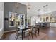 Inviting dining room with outdoor views through kitchen, great for Gathering meals and gatherings at 166 S Rainbow Trl, Evergreen, CO 80439