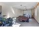Spacious garage featuring a motorcycle and classic Corvette, offering ample storage and parking at 166 S Rainbow Trl, Evergreen, CO 80439