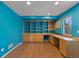 A bright office with a built-in desk and bookshelves with lots of natural light at 166 S Rainbow Trl, Evergreen, CO 80439