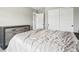 This bedroom features a plush bed with decorative pillows and comfortable bedding at 16881 E 110Th Ave, Commerce City, CO 80022