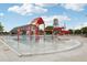 A community pool featuring a ' area and a slide and large pool for swimming laps at 16881 E 110Th Ave, Commerce City, CO 80022