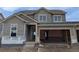 Two-story home featuring a two-car garage and neutral-colored siding, still under construction at 16815 Mckay Dr, Mead, CO 80542