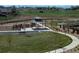 Community park featuring a picnic shelter, walking paths, green space, and mountain views at 16815 Mckay Dr, Mead, CO 80542