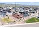 Areal view of a suburban neighborhood featuring two story homes and solar panels at 8372 Bijou Creek Ave, Littleton, CO 80125