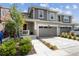 Charming two-story townhome with a two-car garage and well-maintained landscaping at 9503 Richfield St, Commerce City, CO 80022