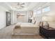 Bright main bedroom with tray ceiling, plush carpet, and large windows for natural light at 9503 Richfield St, Commerce City, CO 80022