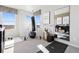 Bright exercise room with large windows, punching bag, and yoga mat at 1372 S Boston Ct # A, Denver, CO 80247