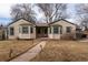 Charming home featuring classic design, a walkway, and a welcoming front yard at 2735 S Humboldt St, Denver, CO 80210