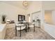 Stylish dining room with modern lighting, a round table, and sophisticated decor for elegant gatherings at 5016 S Nelson St # C, Littleton, CO 80127