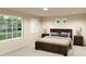 Spacious bedroom with large window and plenty of natural light at 22313 E 38Th Pl, Aurora, CO 80019