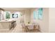Light-filled dining area adjacent to the kitchen at 22313 E 38Th Pl, Aurora, CO 80019