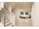 Modern staircase leading to the upper level of the home at 22313 E 38Th Pl, Aurora, CO 80019