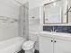 Modern bathroom with stylish tile accents, vanity, and framed mirror at 5711 W 92Nd Ave # 25, Westminster, CO 80031
