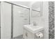 Modern bathroom featuring stylish gray and white tile in shower and mosaic floor at 5711 W 92Nd Ave # 25, Westminster, CO 80031