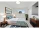 Bright bedroom with a queen bed, neutral tones, stylish furnishings, and a serene ambiance at 5711 W 92Nd Ave # 25, Westminster, CO 80031
