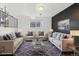 Cozy living room with plush sofas, accent pillows, and a glass coffee table on a patterned rug at 5711 W 92Nd Ave # 25, Westminster, CO 80031