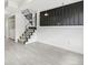 Bright living room with staircase, tile flooring, and access to a utility closet at 5711 W 92Nd Ave # 25, Westminster, CO 80031