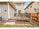 Inviting outdoor deck space perfect for entertaining with a grill and dining set at 10452 Rutledge St, Parker, CO 80134