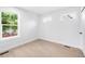 Bright bedroom featuring hardwood floors, white walls, and natural light from multiple windows at 4640 W 39Th Ave, Denver, CO 80212