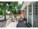 Inviting front porch with seating, a colorful rug, and stylish decor at 4640 W 39Th Ave, Denver, CO 80212