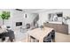 Bright living room with a modern fireplace, plush seating, and stylish decor at 4640 W 39Th Ave, Denver, CO 80212