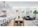 Open living space featuring a modern kitchen, dining area and comfortable seating area at 4640 W 39Th Ave, Denver, CO 80212