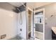 Bathroom showcasing a tiled shower/tub combination, closet, and gray walls at 26167 De Berry St, Conifer, CO 80433