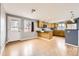 A kitchen offers wood cabinets, an island, and an open layout, perfect for entertaining at 26167 De Berry St, Conifer, CO 80433