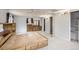 Spacious main bedroom with a wooden bed frame, natural light, and neutral walls at 26167 De Berry St, Conifer, CO 80433