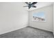 Bedroom with window view and ceiling fan at 711 Elm St, Frederick, CO 80530