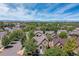 Scenic aerial view of a neighborhood, showcasing beautiful homes and mountain views at 507 Ulster Way, Denver, CO 80230