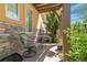 Cozy outdoor patio with stone accents, seating, and table, perfect for relaxing at 507 Ulster Way, Denver, CO 80230