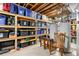 Basement storage area with ample shelving, perfect for organizing and storing household items efficiently at 507 Ulster Way, Denver, CO 80230