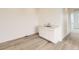 The bonus room has wood flooring and a sink at 8866 Waterleaf Ln, Littleton, CO 80125
