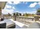 Outdoor back deck featuring views of the neighborhood and lounge seating at 1500 Sun Way, Lafayette, CO 80026