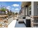 Inviting front porch with comfortable seating, perfect for relaxing outdoors at 1500 Sun Way, Lafayette, CO 80026