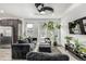 Open-concept living area with modern design and seamless flow to the kitchen at 1500 Sun Way, Lafayette, CO 80026