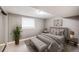 Basement bedroom featuring neutral decor, plush carpet, and a comfortable bed at 3889 S Fraser St, Aurora, CO 80014