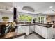 Modern kitchen showcasing granite countertops, stainless steel appliances, and ample cabinet space at 3889 S Fraser St, Aurora, CO 80014