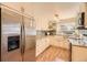 Eat-in kitchen features stainless steel appliances, granite countertops, and ample cabinet space at 4401 S Yosemite Ct, Greenwood Village, CO 80111