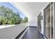 Relax on this condo balcony overlooking mature trees, perfect for enjoying the outdoors in a private setting at 1250 N Humboldt St # 202, Denver, CO 80218