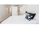 Bedroom with a queen bed, hardwood floors, barn door closet with custom shelving at 1250 N Humboldt St # 202, Denver, CO 80218