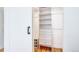 Walk-in closet with custom shelving, drawers, and ample storage space at 1250 N Humboldt St # 202, Denver, CO 80218
