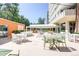 Enjoy this beautifully landscaped courtyard with tables and chairs to relax and enjoy the weather at 1250 N Humboldt St # 202, Denver, CO 80218